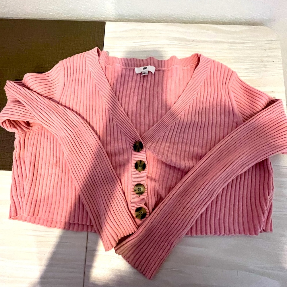 This top is super comfy and stylish the color is light pink